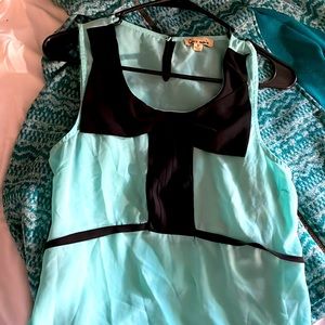 This blue and black bow shirt